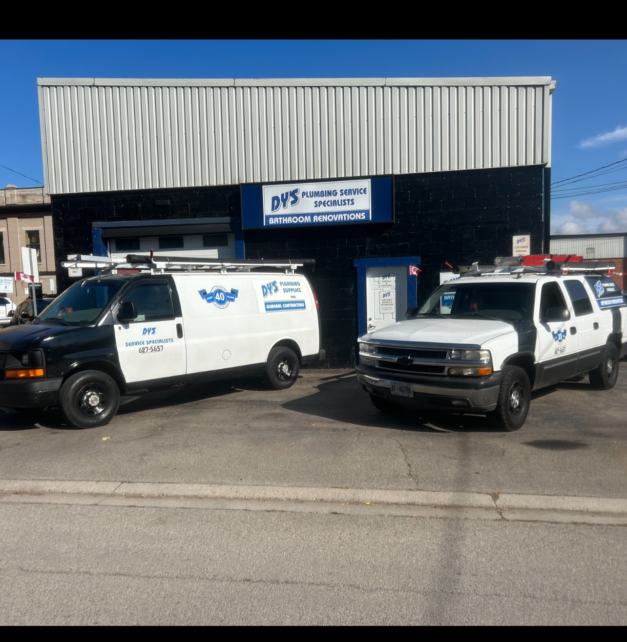 Dy's Plumbing building and service vehicles in Dundas